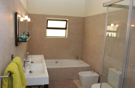 Fam-bathroom-web.jpg- Family Bathroom, equiped with a shower, bath, toilet, bidet and a double wash basin.